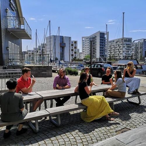 Ice cream break on the harbor of Odense